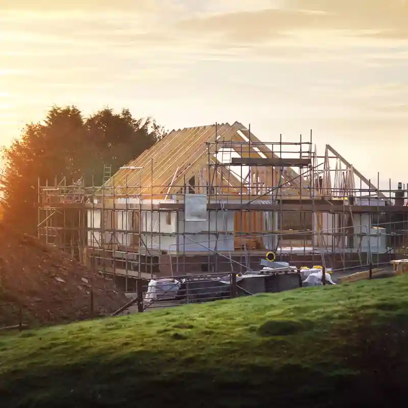 New home construction with sunset.